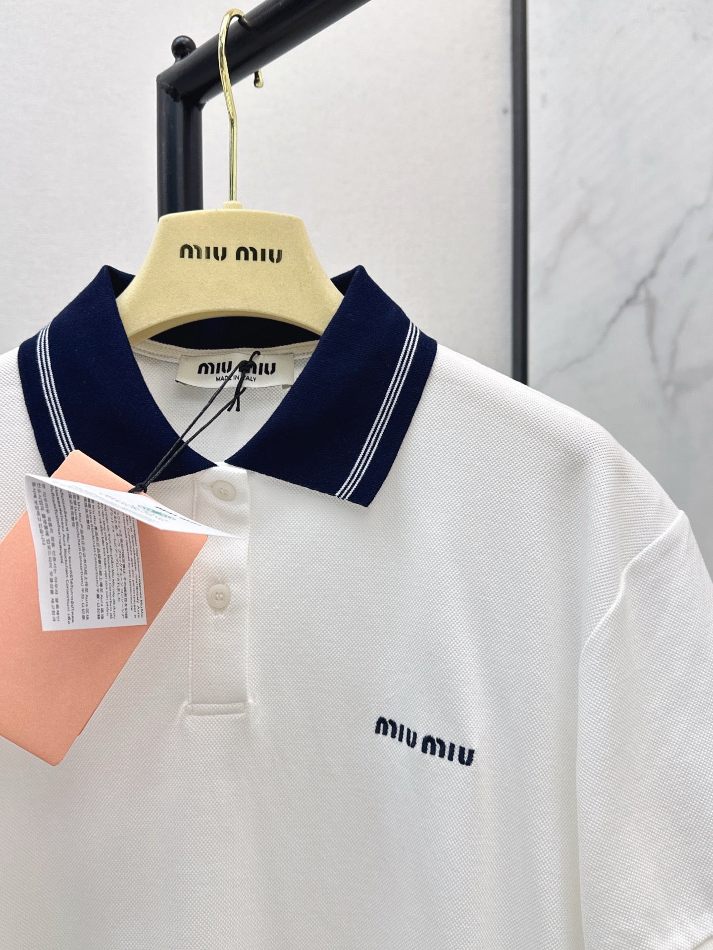 M*u 25ss logo embroidered polo shirt
