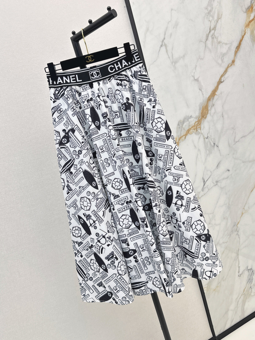 C*nel 25ss technical silk flared skirt