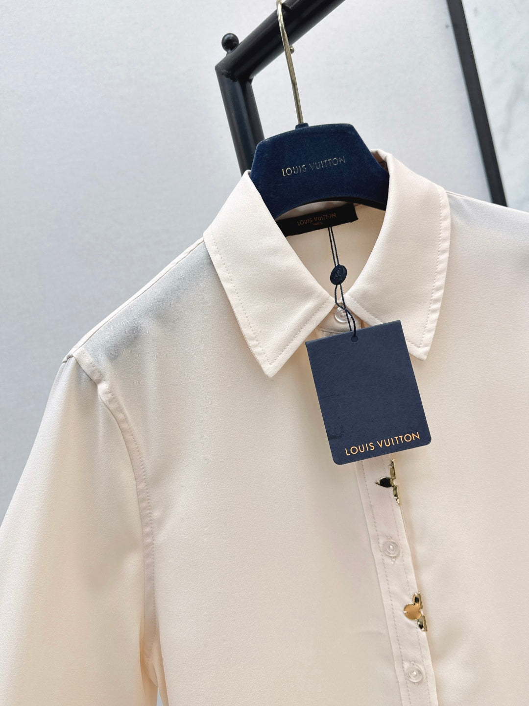 Loui* golden monogram flower accent shirt