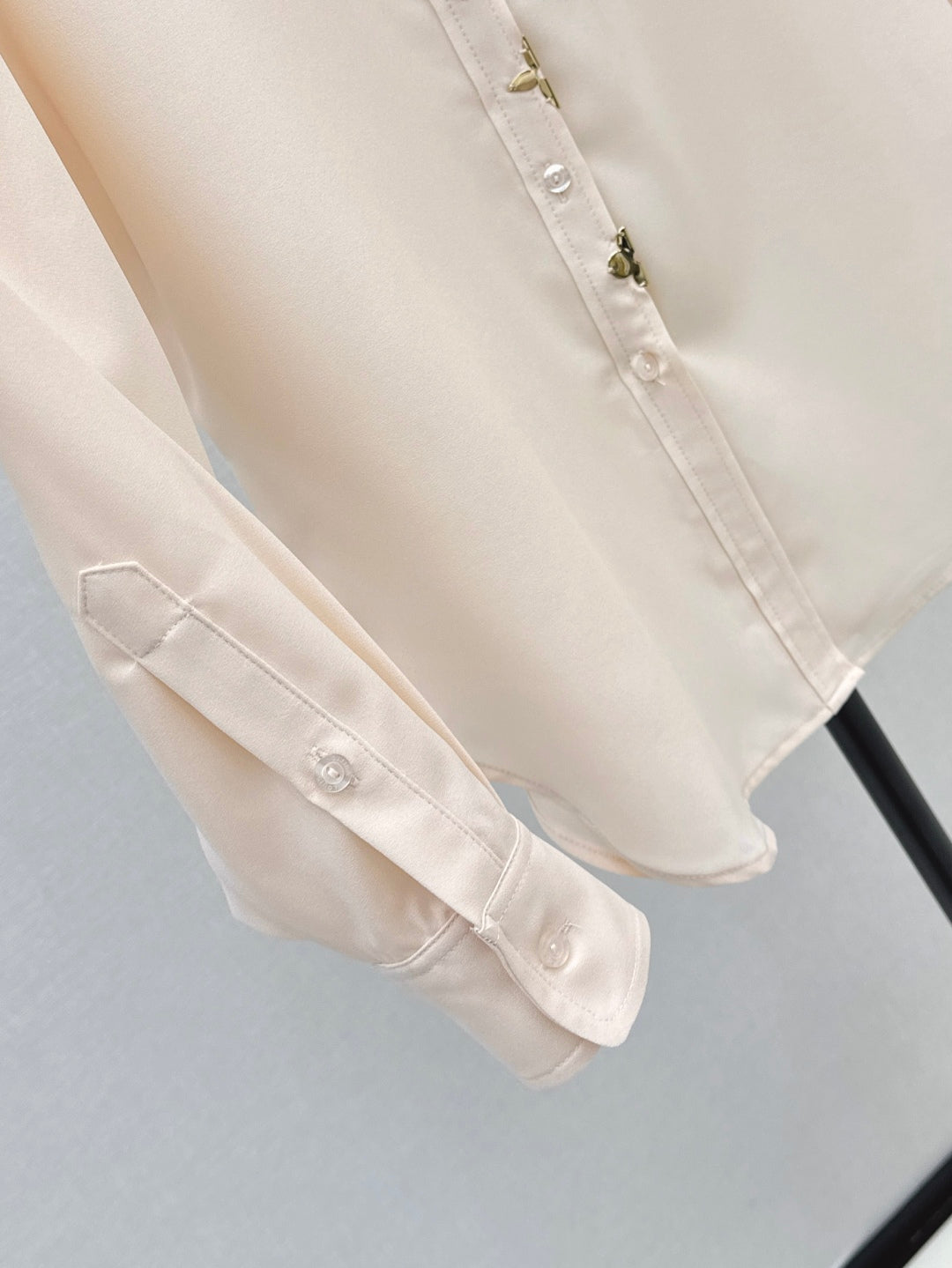 Loui* golden monogram flower accent shirt