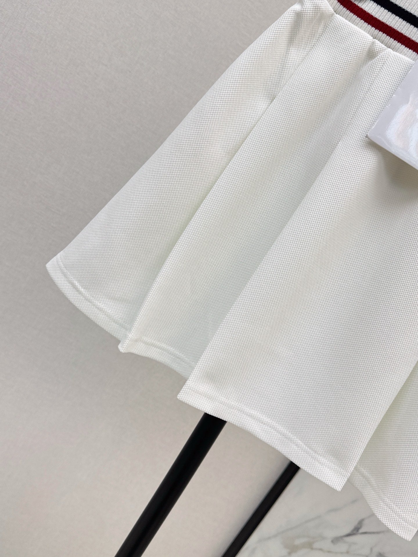 D*r 25ss Web waist pleated mini skirt