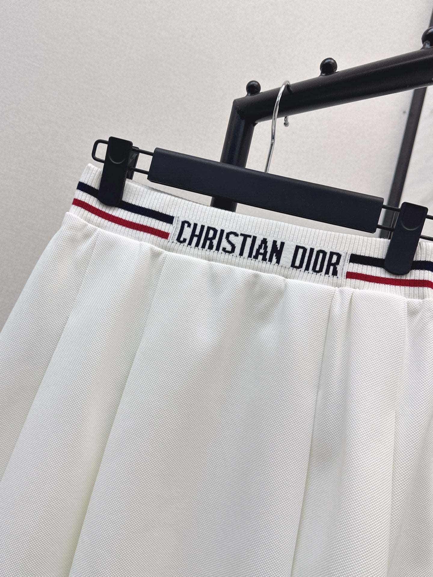 D*r 25ss Web waist pleated mini skirt