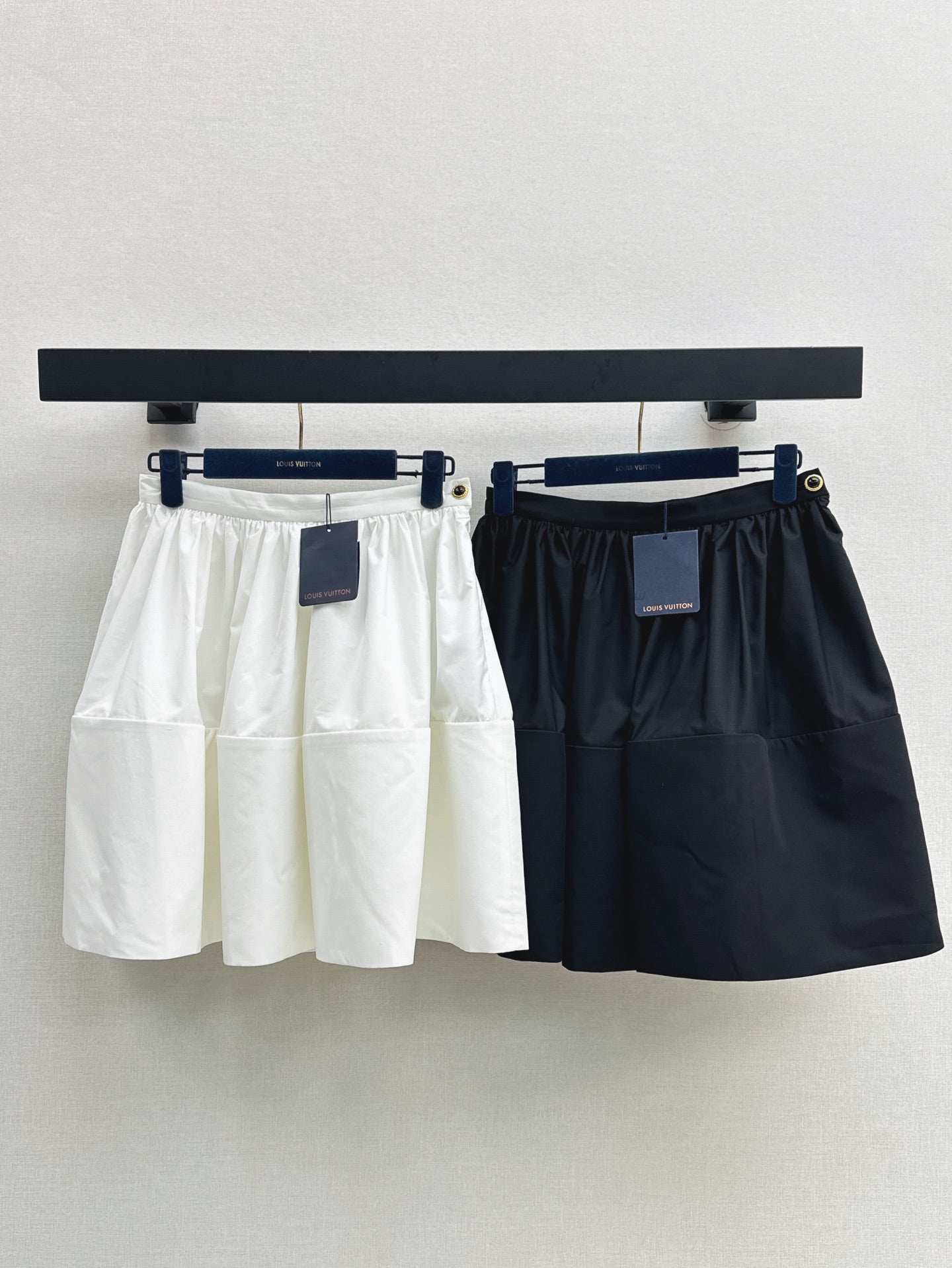 Loui* 25ss XL hem mini skirt