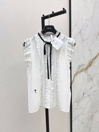 D*r 25ss Ruffled sleeveless shirt with black velvet lace-up