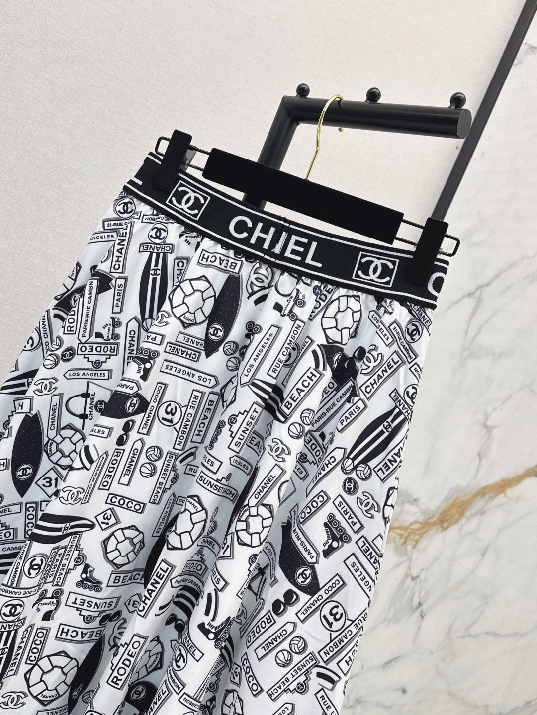 C*nel 25ss technical silk flared skirt