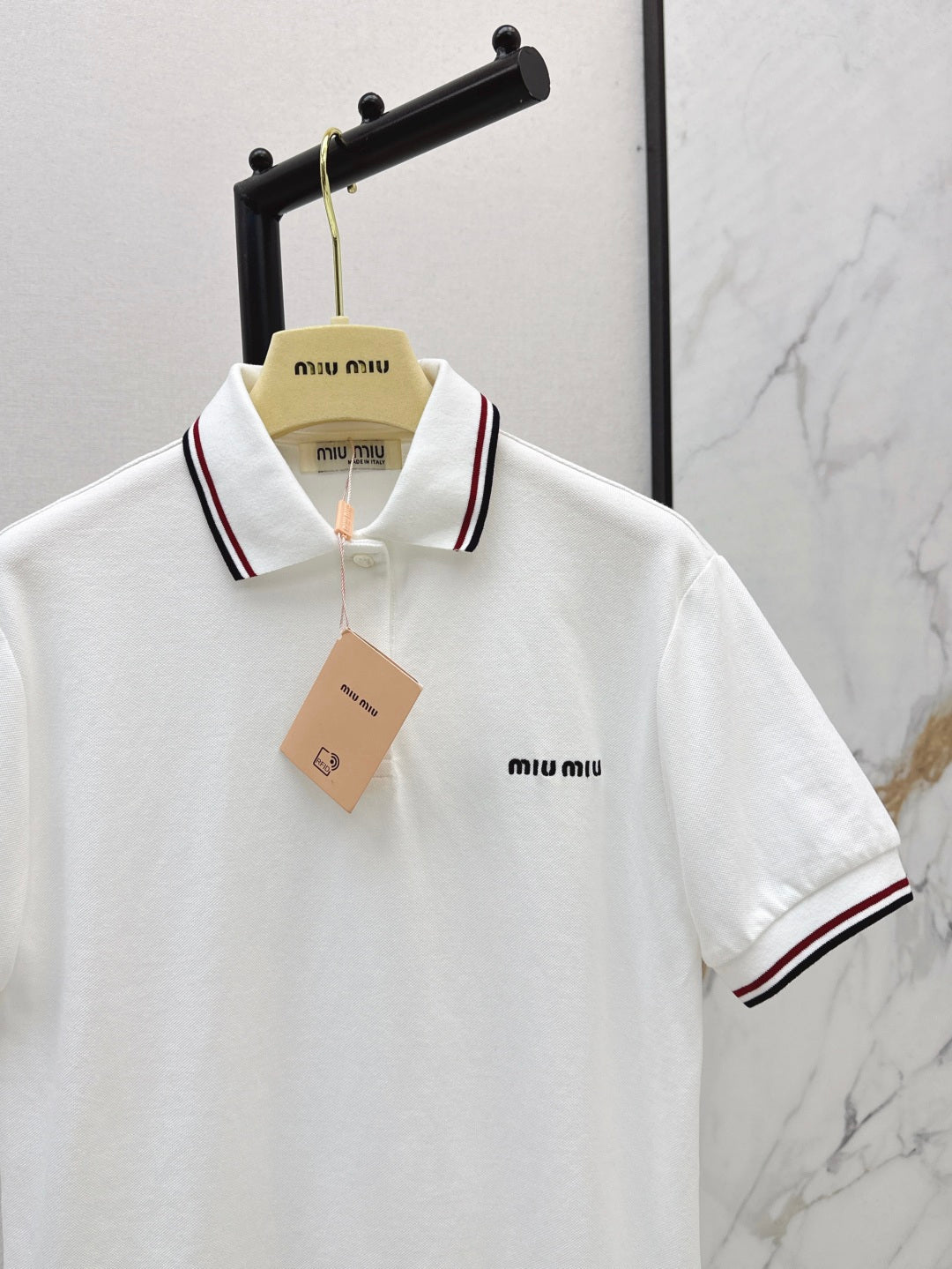 M*u 25ss embroidered polo shirt